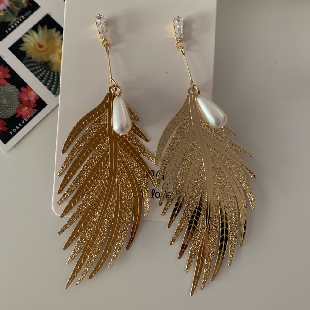 Gold feathers earrings